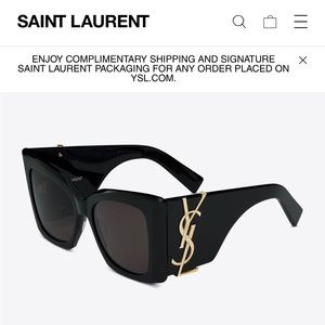 Saint Laurent women’s sunglasses. New in box. Never worn.